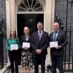 CBA outside the door of Number 10 Downing Street